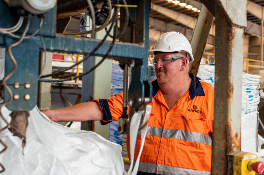 Haynes_Manufacturing_worker with bag 1